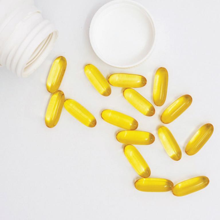 Pure Encapsulations supplements next to a bottle